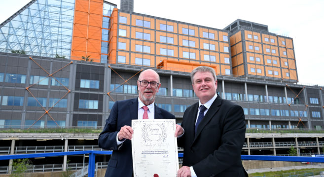 Sandwell College Principal and Hospital CEO hold the signed agreement