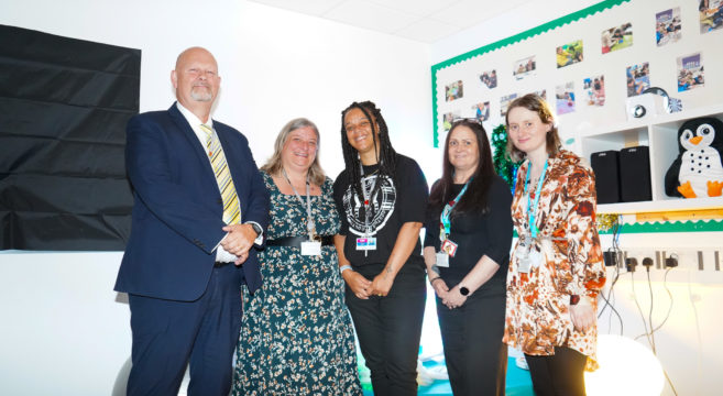 Foundation learning staff smiling at the opening event