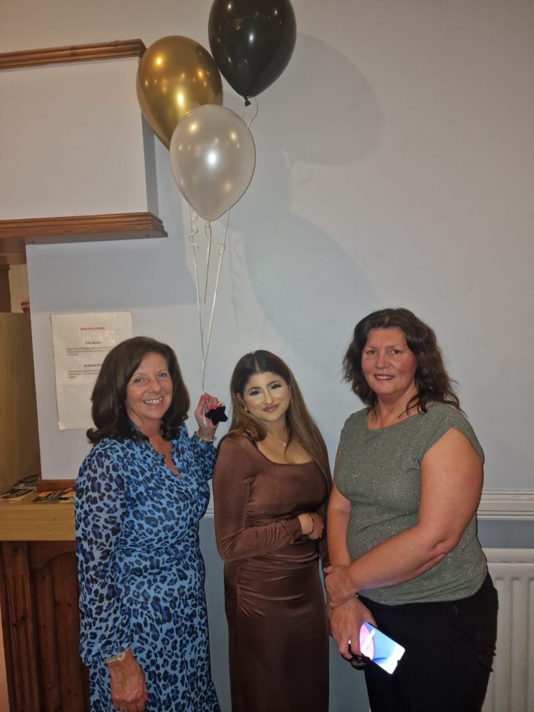 Award winner Nafeesah with employer Suzanne and assessor Emma