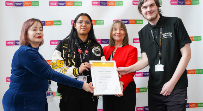 Staff and students at Sandwell College holding Matrix Award Certificate